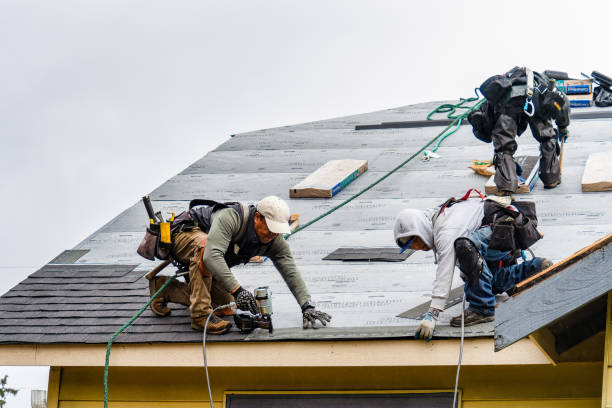 Professional Gutter Installation technician working in Dayville, CT